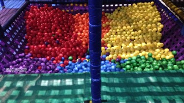 After about 45 minutes the Ball Pit was almost completely organized by color