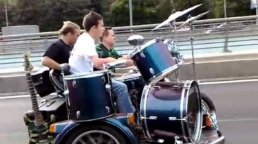 Russian Band Rocks Out While Going Down the Highway on a Motorcycle