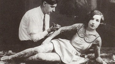 Woman Being Tattooed in the Early 1900s