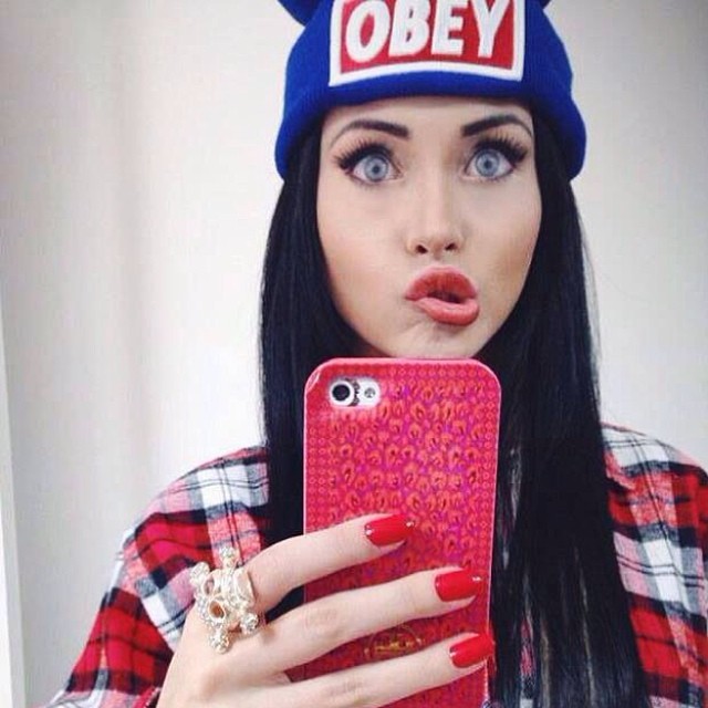 Claudia seems to really enjoy modeling headwear in selfies, and showing off those beautiful lips.