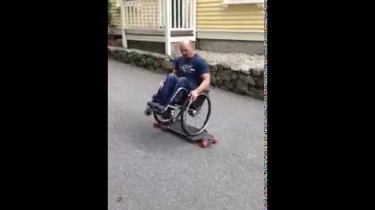 Erik Kondo Rides a Skateboard in a Wheelchair