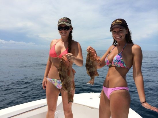 Girls in Bikinis Holding Fish #5