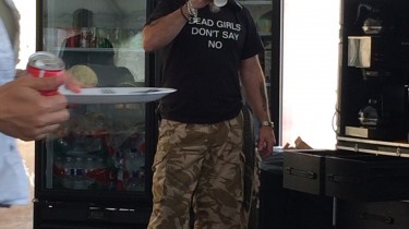 Guy Wearing a T-Shirt That Says Dead Girls Don't Say No