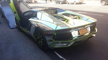 Lamborghini With License Plate That Says Winning