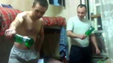 Two Russian Guys Breaking Bottles Over Their Heads, Sort Of