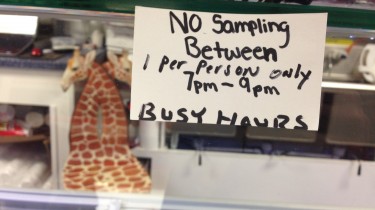 No Sampling Between 7pm - 9pm, 1 Per Person Only Sign at Ice Cream Parlour