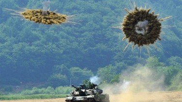 Perfect Timing of a K1 Tank Firing Smoke Shells in South Korea