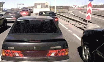 Russian Driver Points a Gun Out The Window