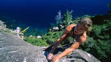 Sexy Woman Gets Chalked Up and Climbs Rock With Her Hands
