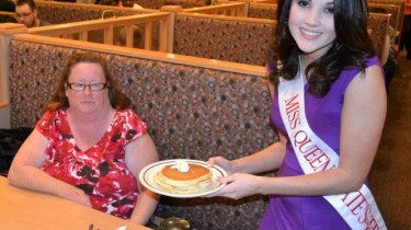 Woman Ain't Got Time for a Photo at National Pancake Day at IHOP