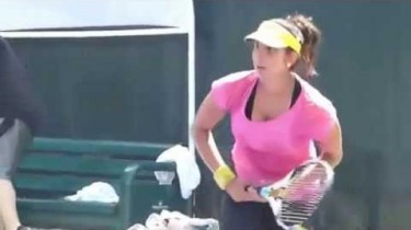 sania mirza practicing tennis serve with boobs and cleavage