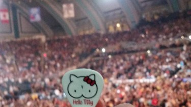 A Fan Catches Hello Titty Guitar Pick From Slash