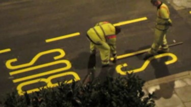 London Road Painters Lay Down Perfect Bus Stop Lettering